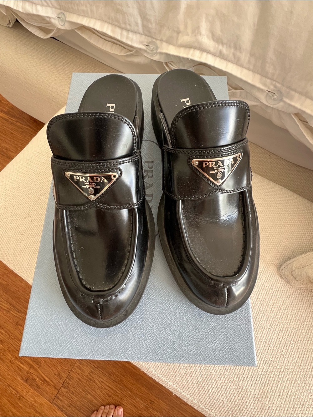 Prada Black Patent Leather Slip-On Loafers with Triangular Logo
